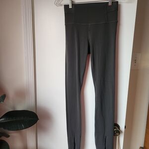 Athleta Aura Split Hem Leggings XS Black High Rise Yoga Clean Girl Athleisure